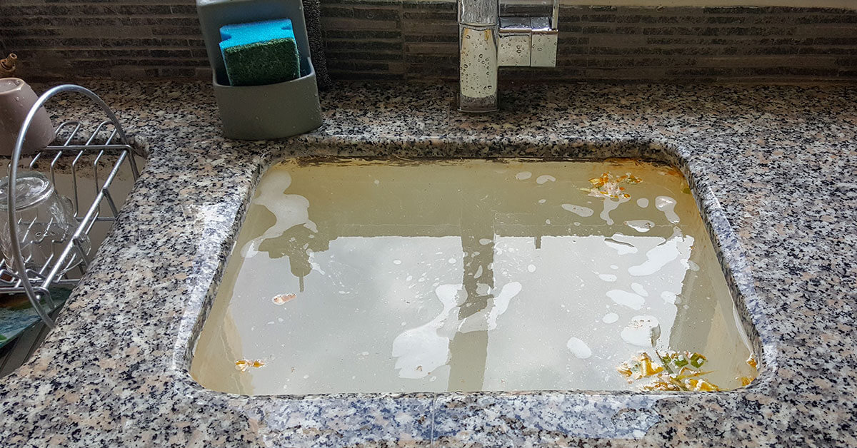 How to Snake a Clogged Sink Drain (With Pictures) - Dengarden